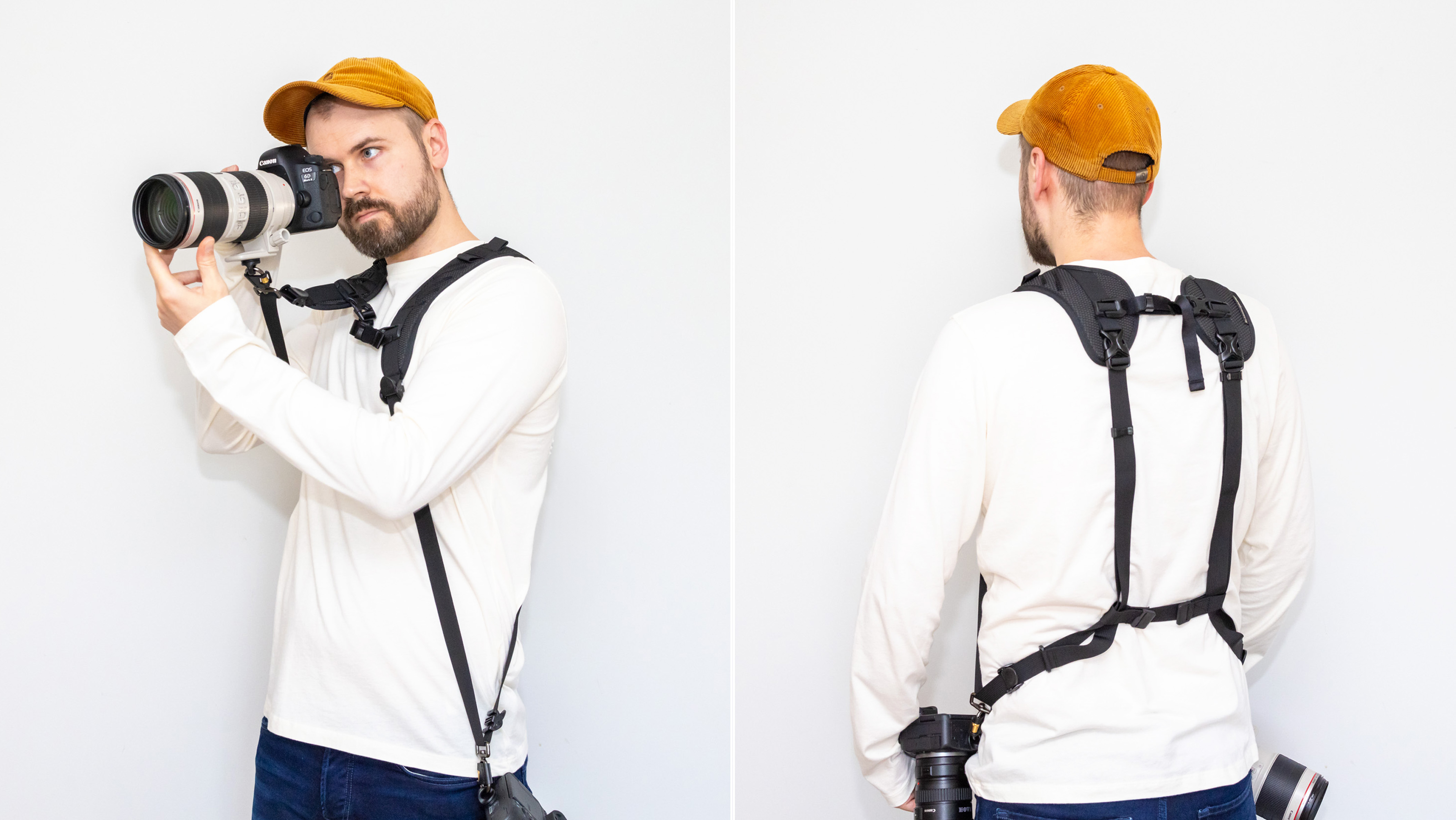 A man wearing the BlackRapid Blackline II Double Camera Harness with a camera brought up to eye level