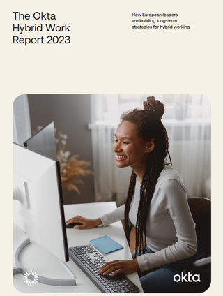 Whitepaper cover with title and image of Smiling female worker at her remote workstation at home