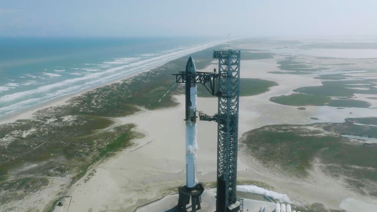 SpaceX&#039;s latest Starship prototype is rimmed with frost during a fueling test on Oct. 24, 2023.