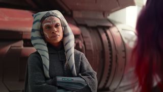 Rosario Dawson as Ahsoka Tano smiling during season of the Disney Plus show, Ahsoka.