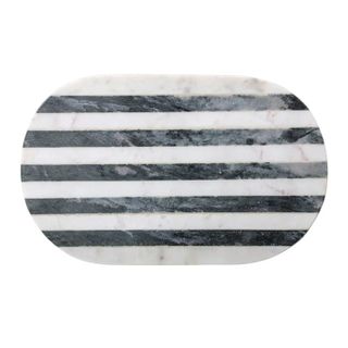  a black and white marble cutting board