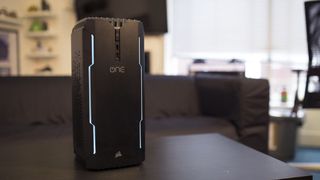 A Corsair One gaming PC placed on a desk