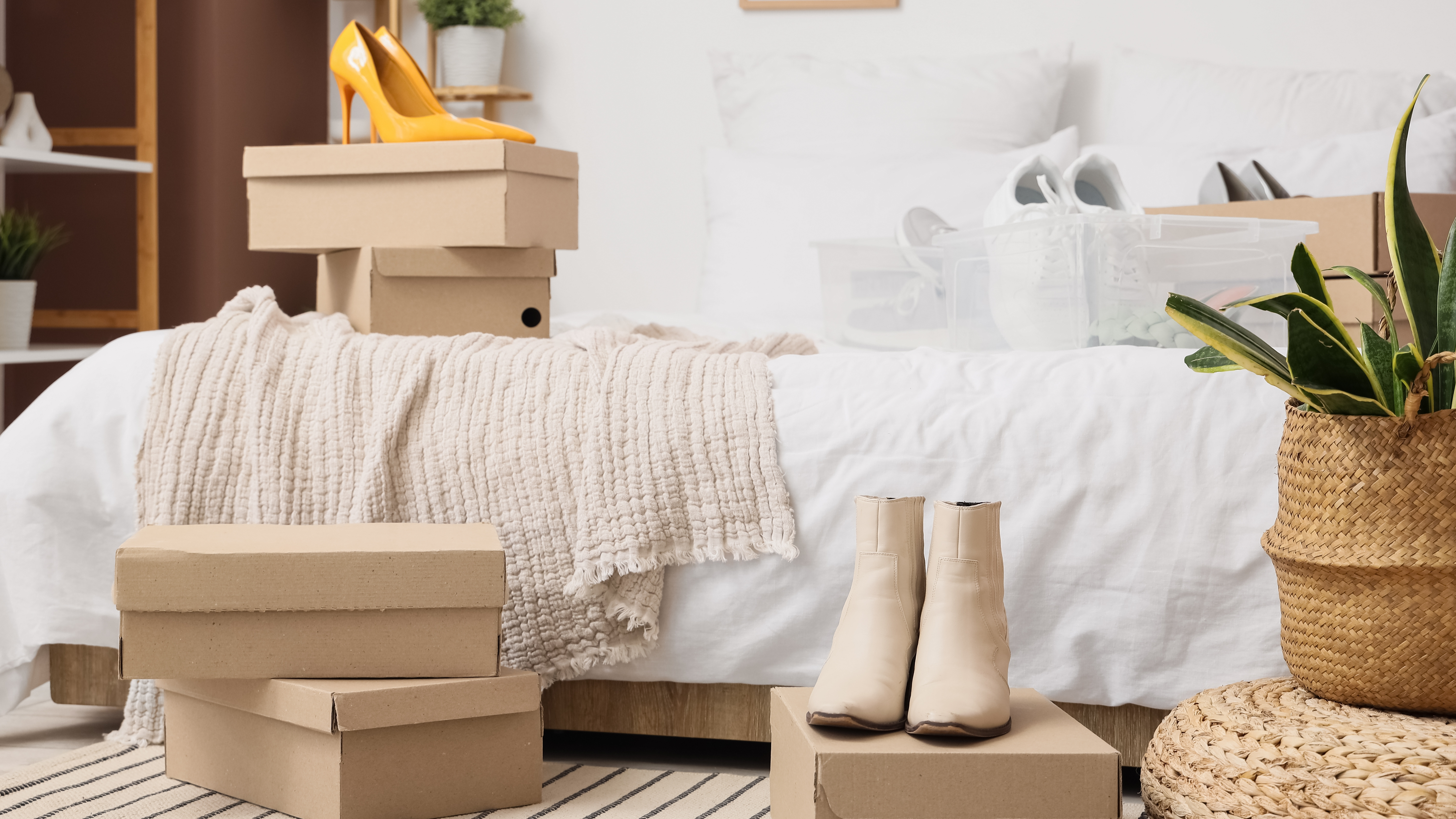 Footwear and shoeboxes in bedroom