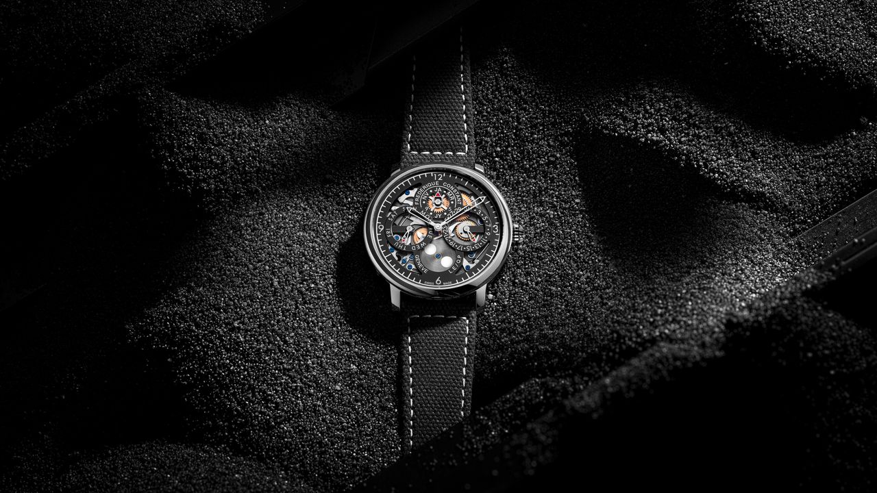 The Frederique Constant Slimline Perpetual Calendar on a black background