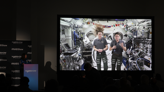 Astronauts in a feed from the space station to the NAB Show