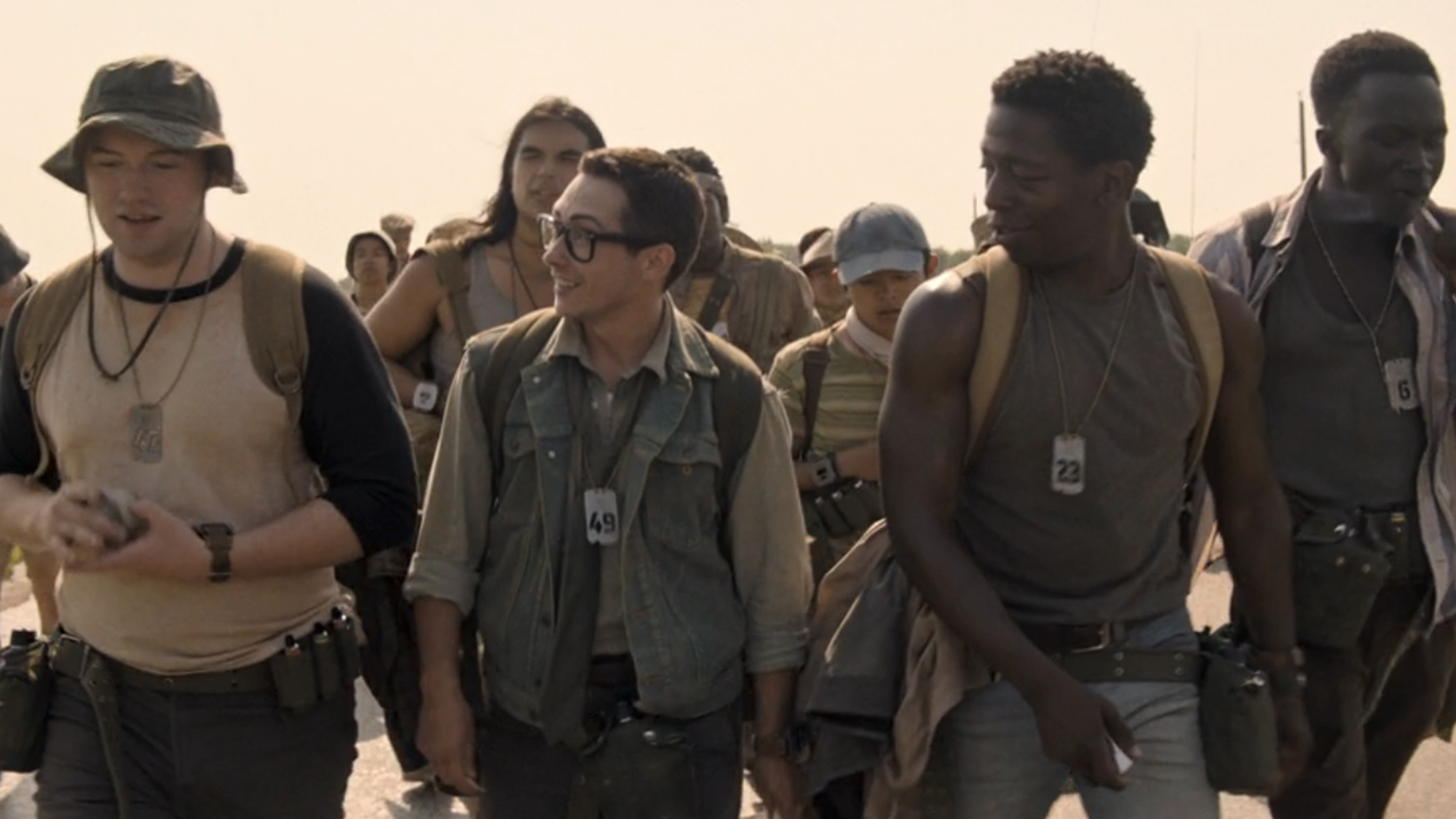 The cast of The Long Walk, walking