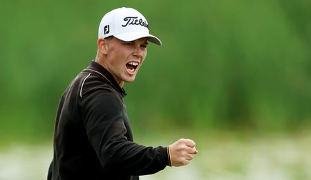 Daniel Hillier fist pumps after holing his putt on the 18th