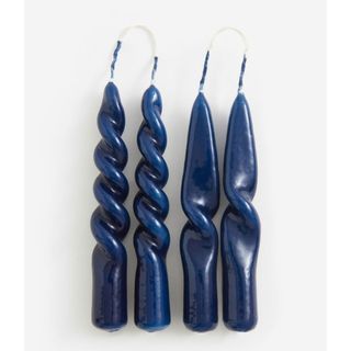 table decor - four navy taper candles in two twisted shapes