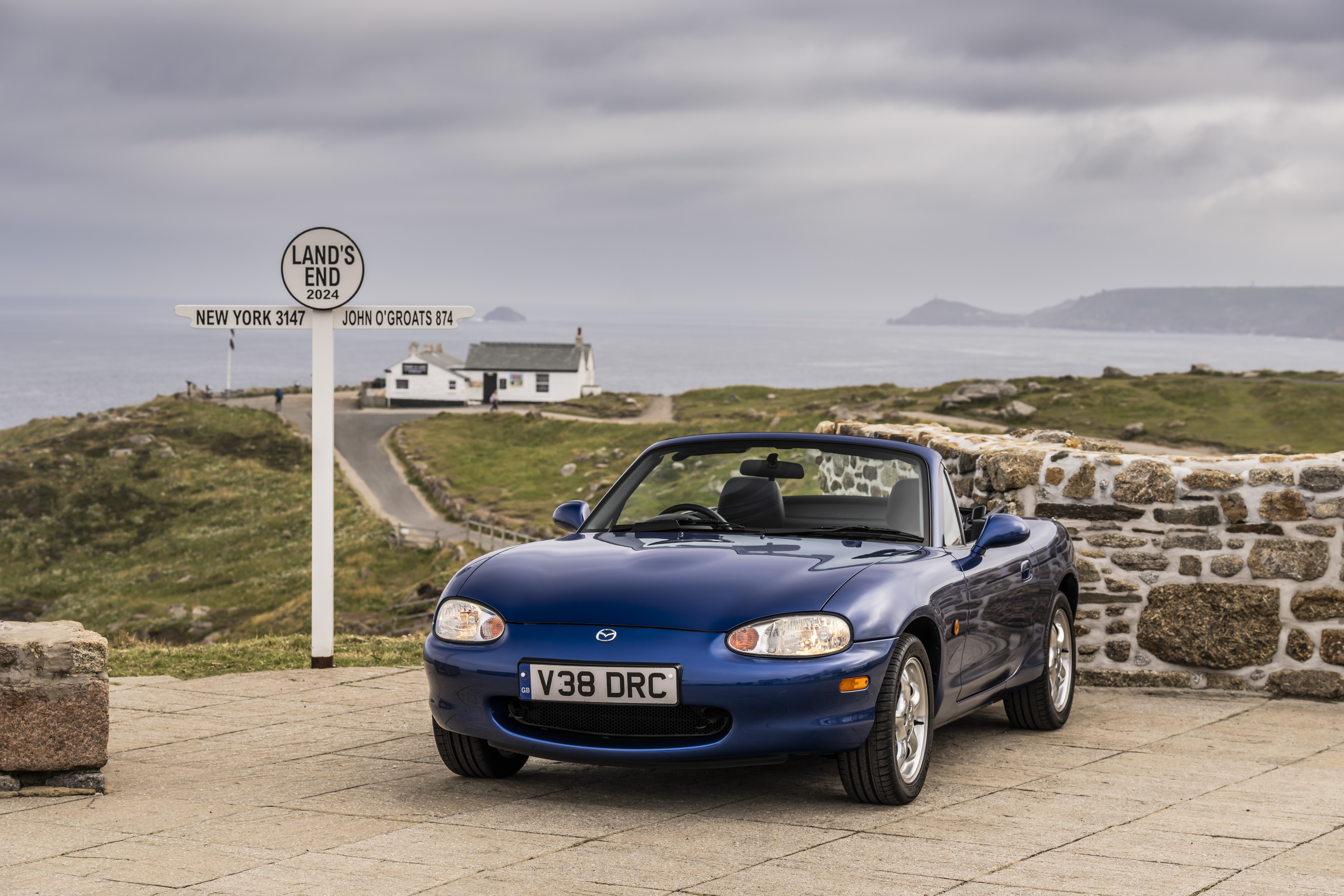 A mazda MX5, zooming through great britain