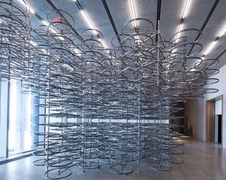 'Forever (1,000)' is made of shiny metal bicycle wheels