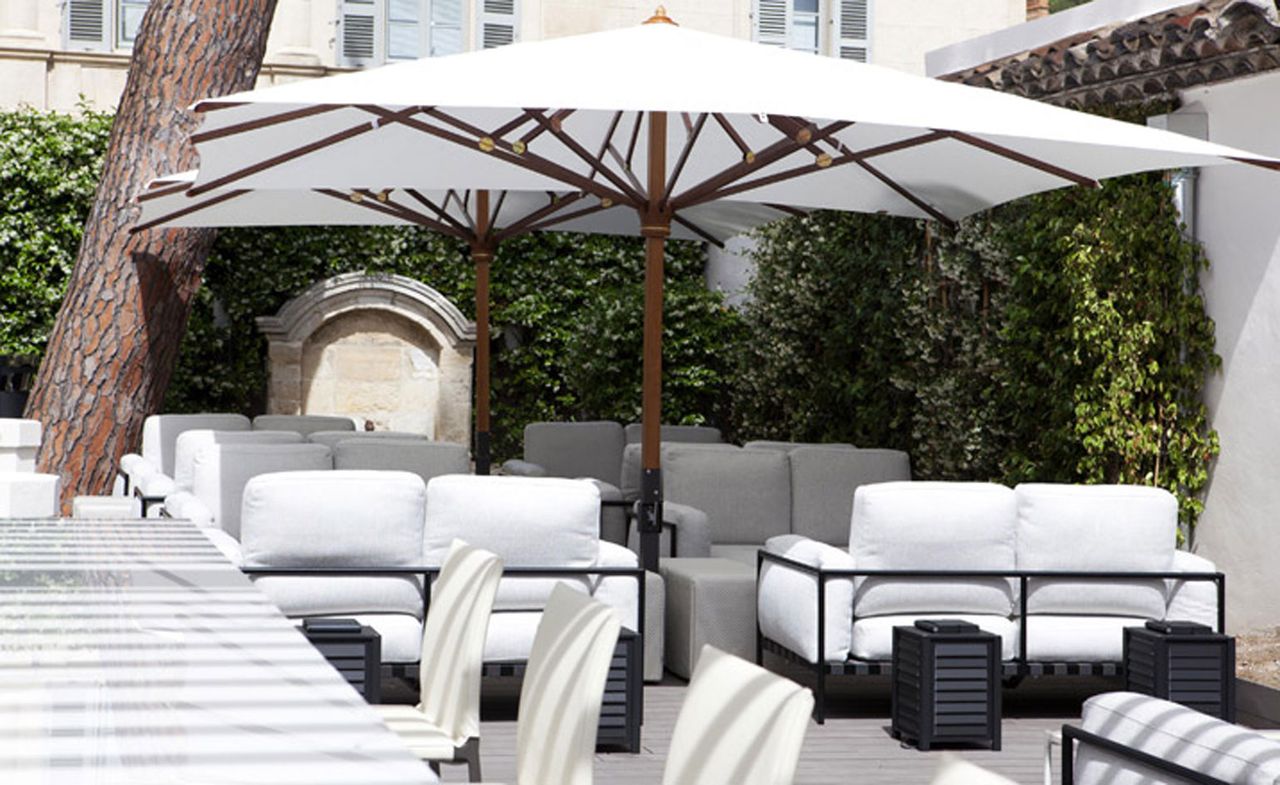 White 1921 Paris - terrace with outdoor furniture and umbrella