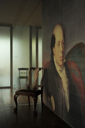 Old fashioned chair and portrait of Nathan Mayer Rothschild on wall