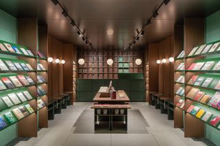 table and bookshelves in Zhang Taiyan by Tsing-Tien Making