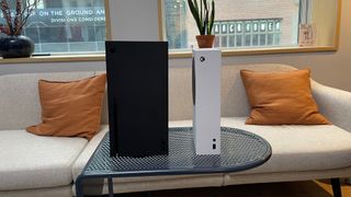 An Xbox Series X next to an Xbox Series S
