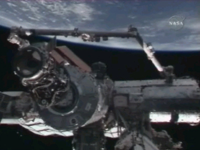 Space Station Astronauts Move Shuttle Docking Port