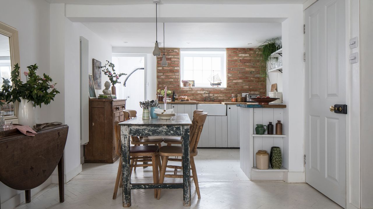 Open plan kitchen and dining area with rustic furniture