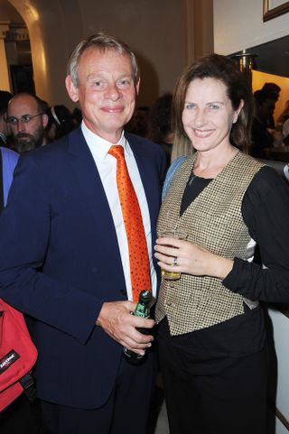 Martin Clunes with his wife