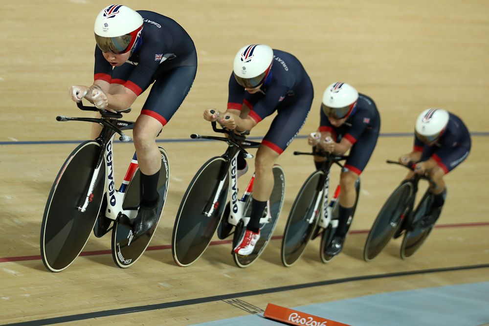 Great Britain pursuit squad on the track