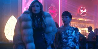 Hustlers Jennifer Lopez and Constance Wu preparing for a con at the strip club