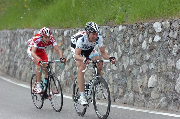 Francesco Bellotti and Jens Voigt are the sole survivors of the six man break.