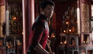 Simu Liu stands ready to fight in Shang Chi and the Legend of the Ten Rings.