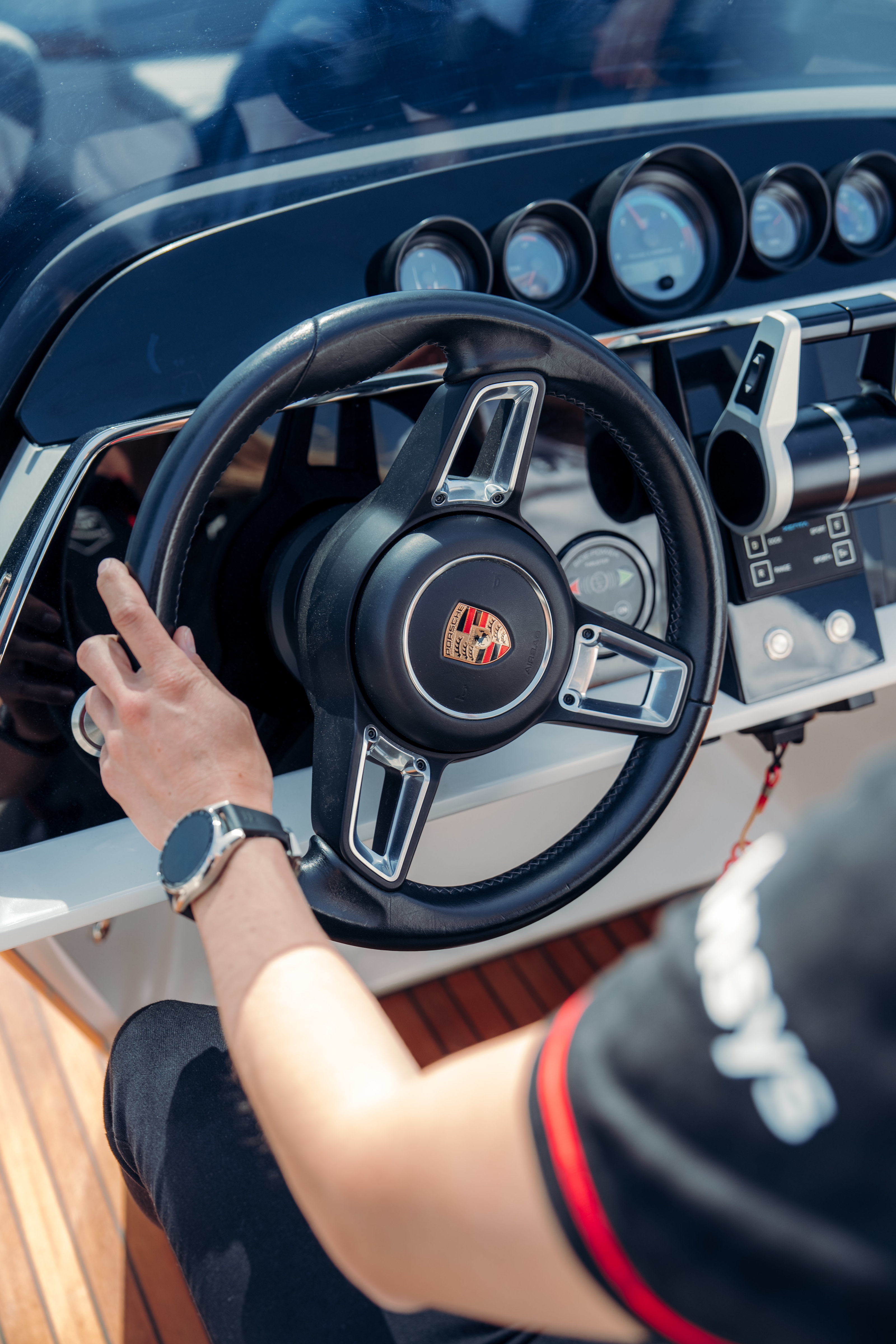 The boat has a Porsche steering wheel