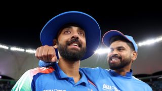 Varun Chakravarthy of India celebrates victory with teammate Shreyas Iyer after defeating New Zealand during the ICC Champions Trophy 2025 match and making it to the India vs Australia semi-final of the ICC Champions Trophy