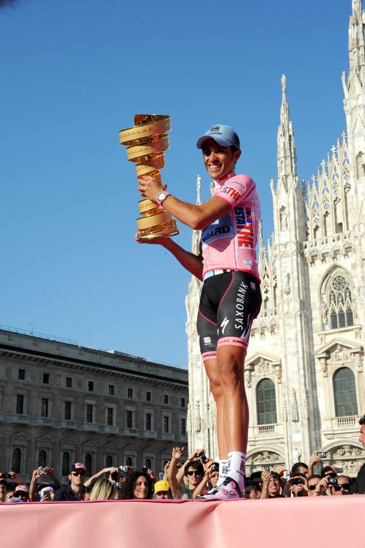 Alberto Contador poses with the Giro trophy after the final time trial in 2011 but would lose the victory