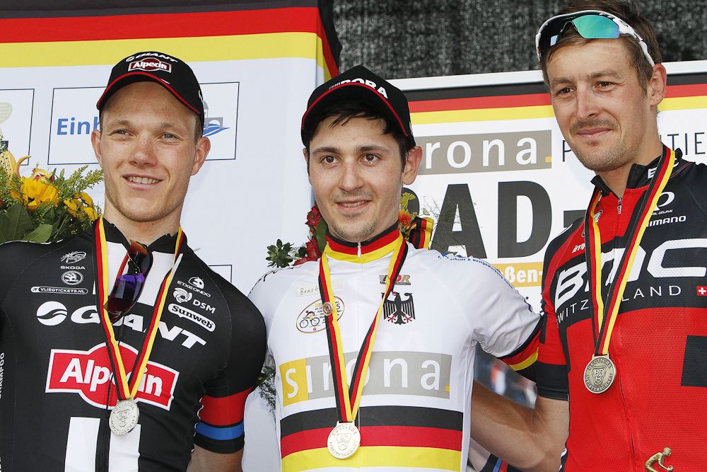 Emanuel Buchmann (Bora-Argon18) on the podium with Arndt and Burghardt.