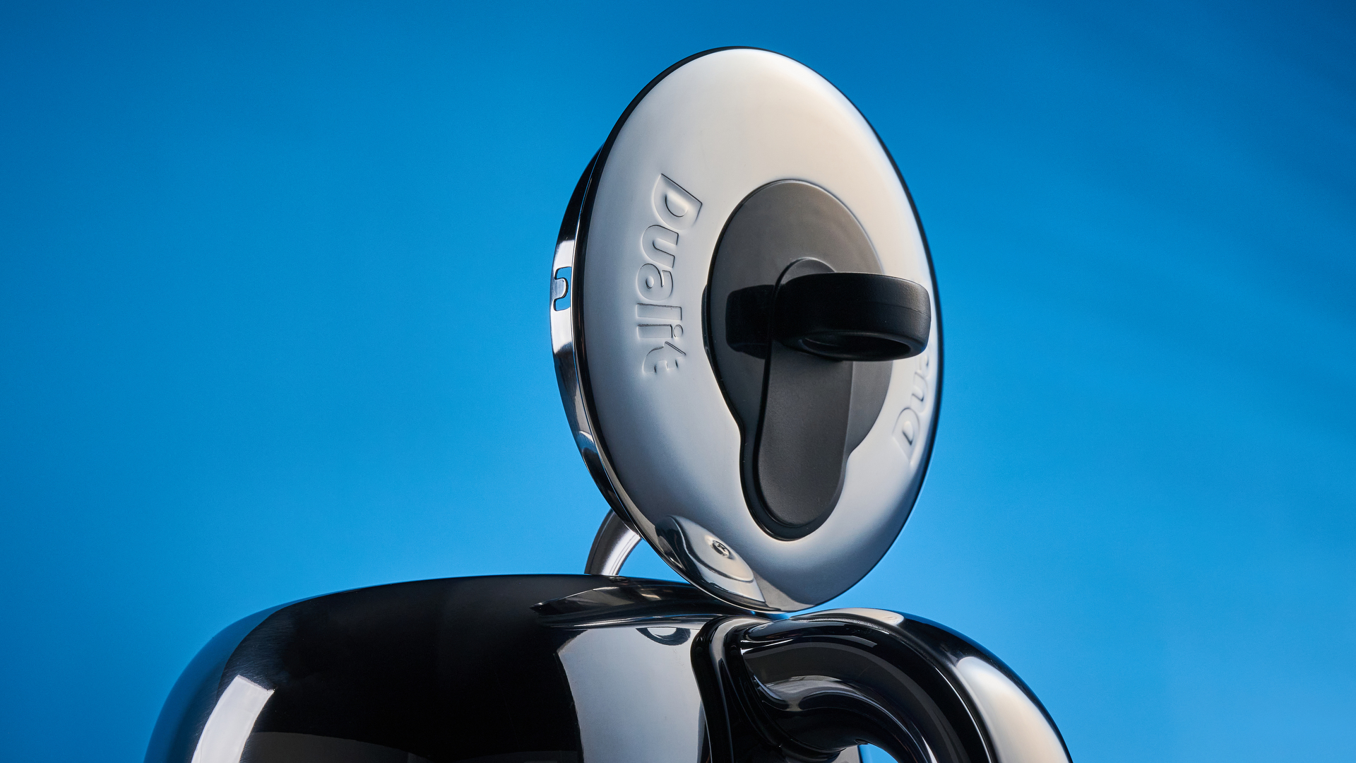 Dualit Classic Kettle photographed in front of a blue background