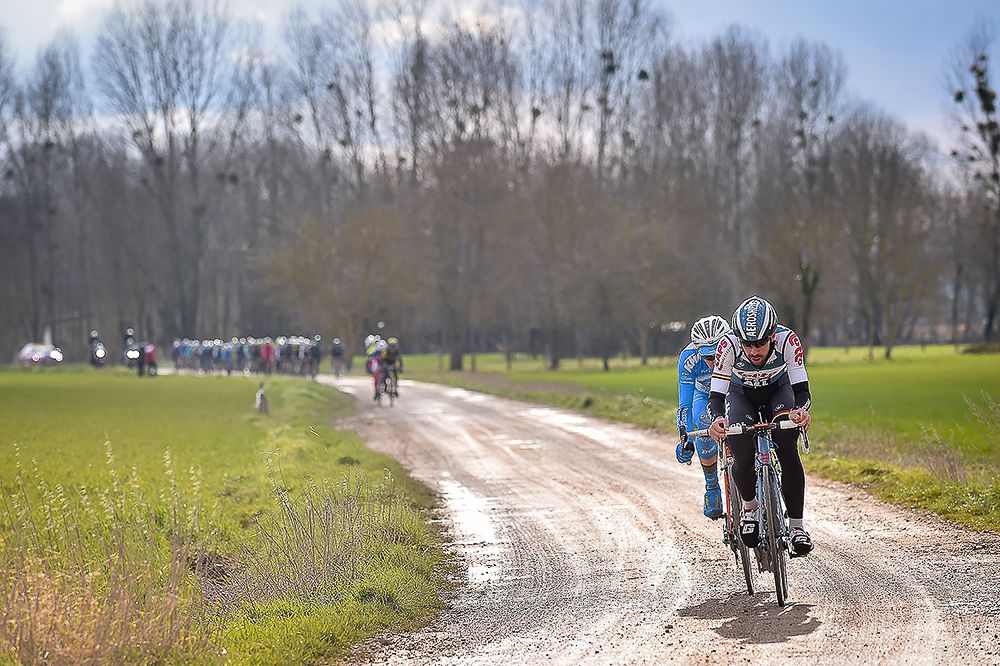 Riders attack on the gravel roads during stage 1 at Paris-Nice
