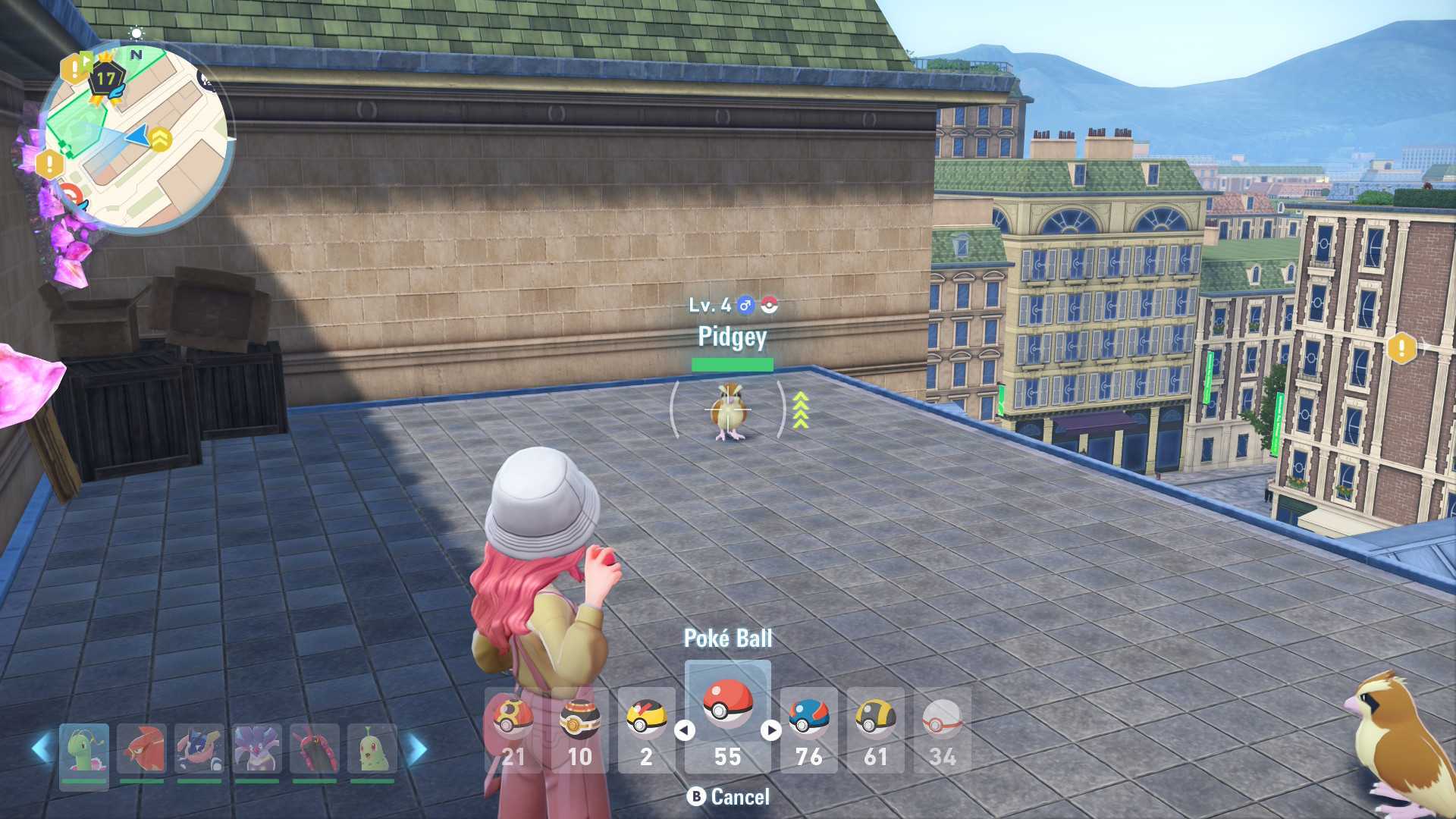 Aiming a Poke Ball at a Pidgey on a rooftop in Pokemon Legends: Z-A.