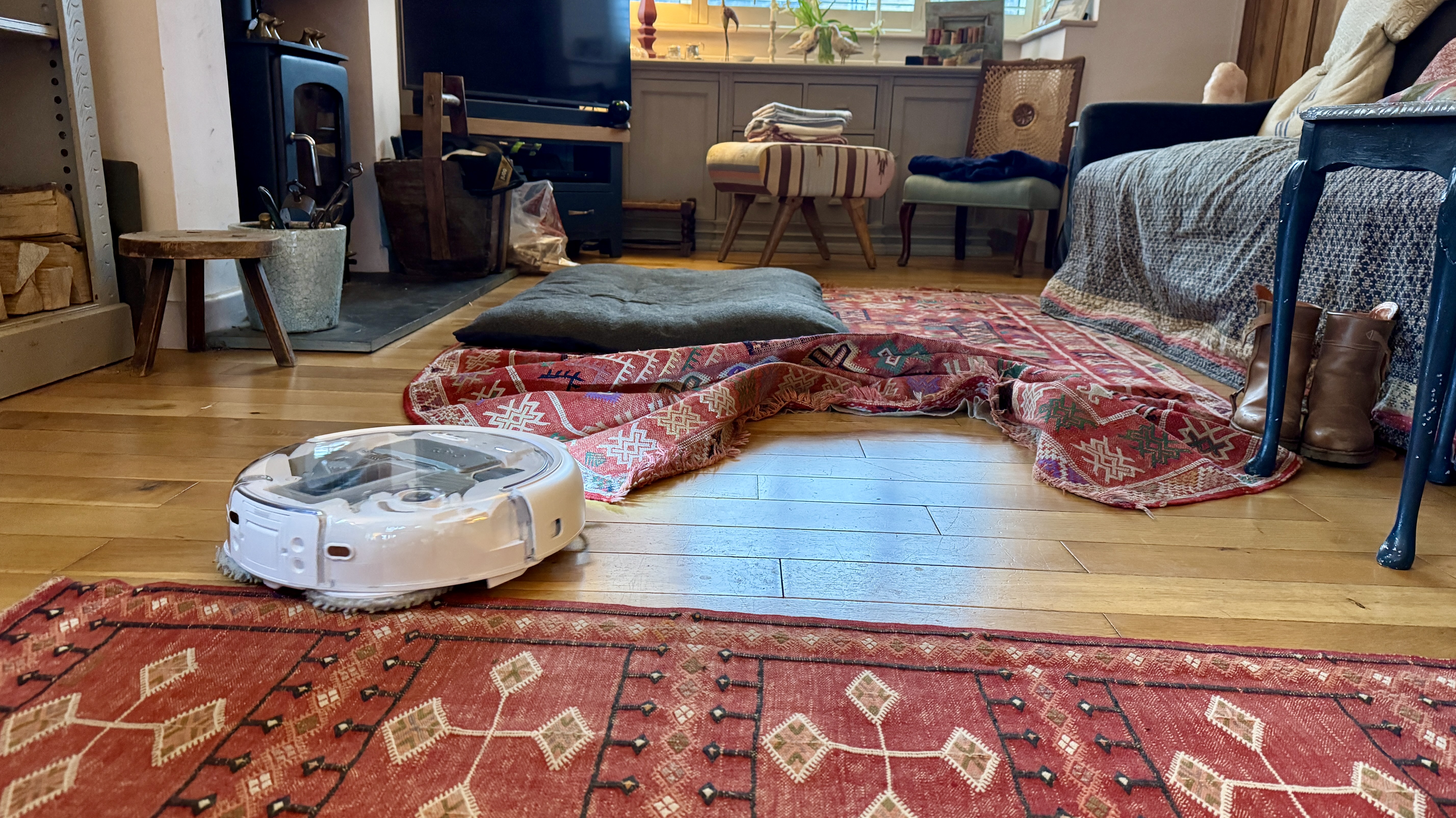 DJI Romo P robot vacuum tangled on rug