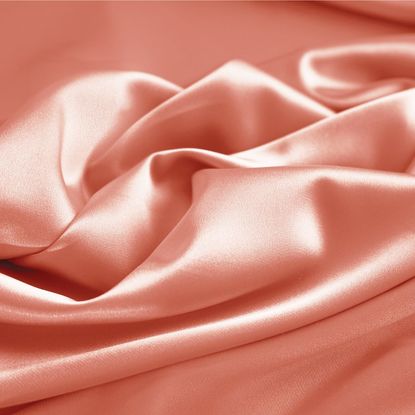 Kamasutra positions: A pink silk sheet