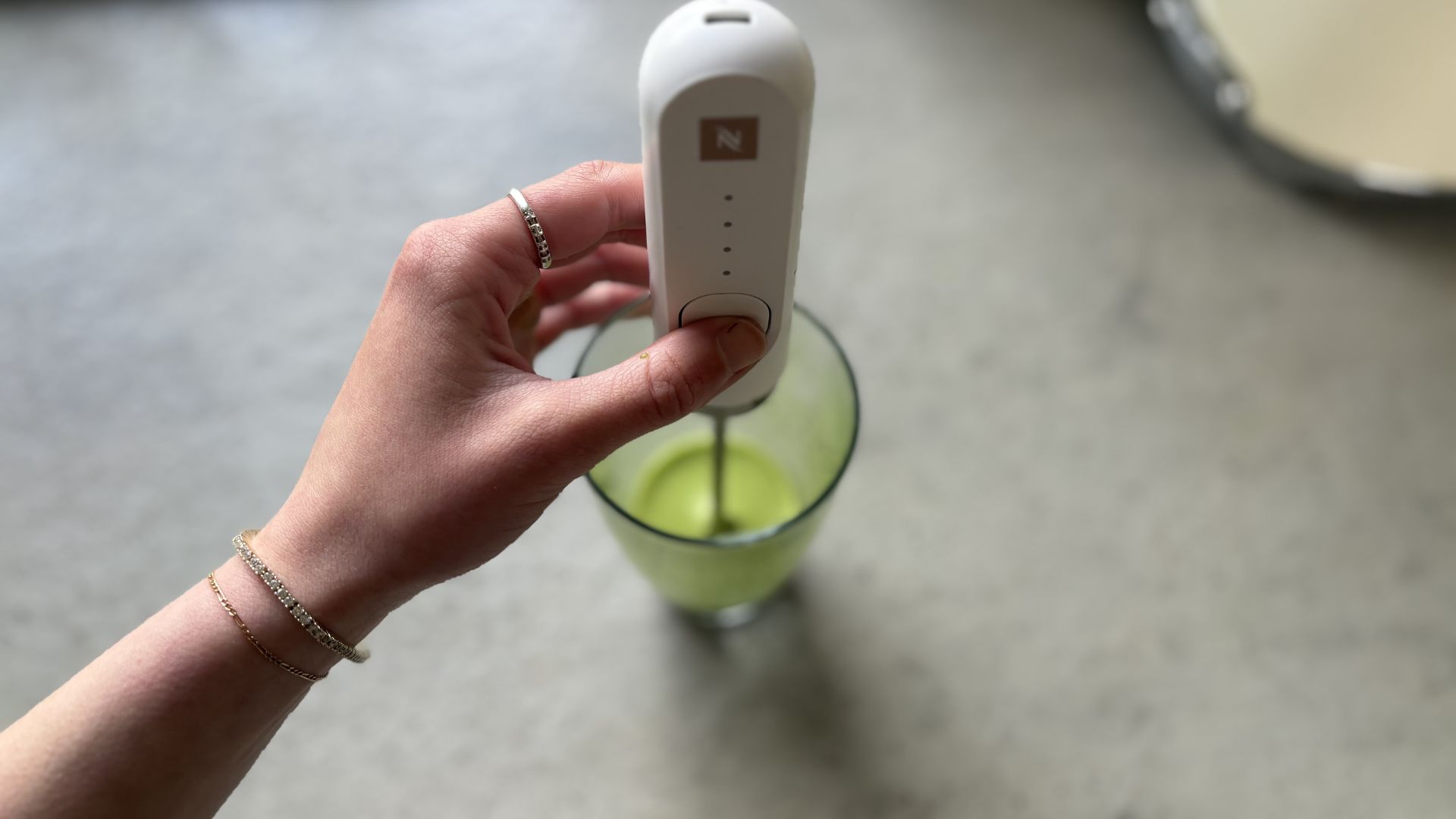 Nespresso NanoFoamer Milk Frother being tested