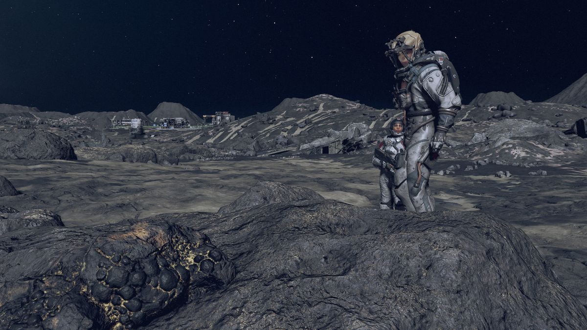 Starfield scanning - the character is standing on a rocky planet, looking at a mineable node