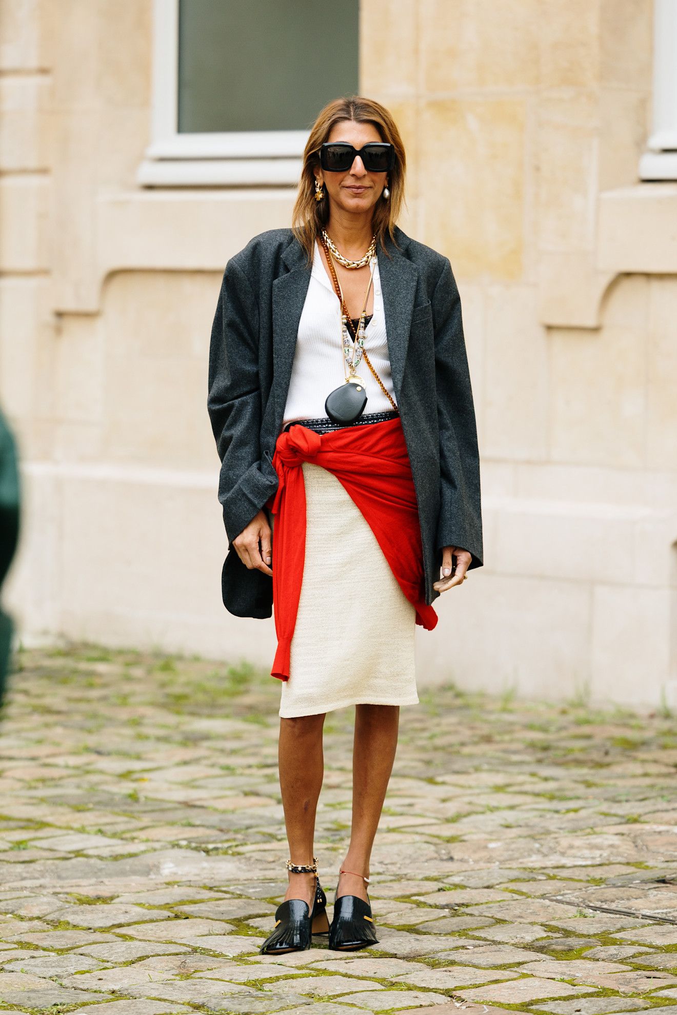 Paris Fashion Week Street Style: Jumpers as accessories.
