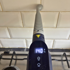 Beldray Digital Handheld Steam Cleaner on tile grout
