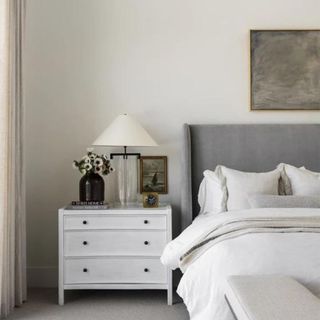 A gray square bed frame