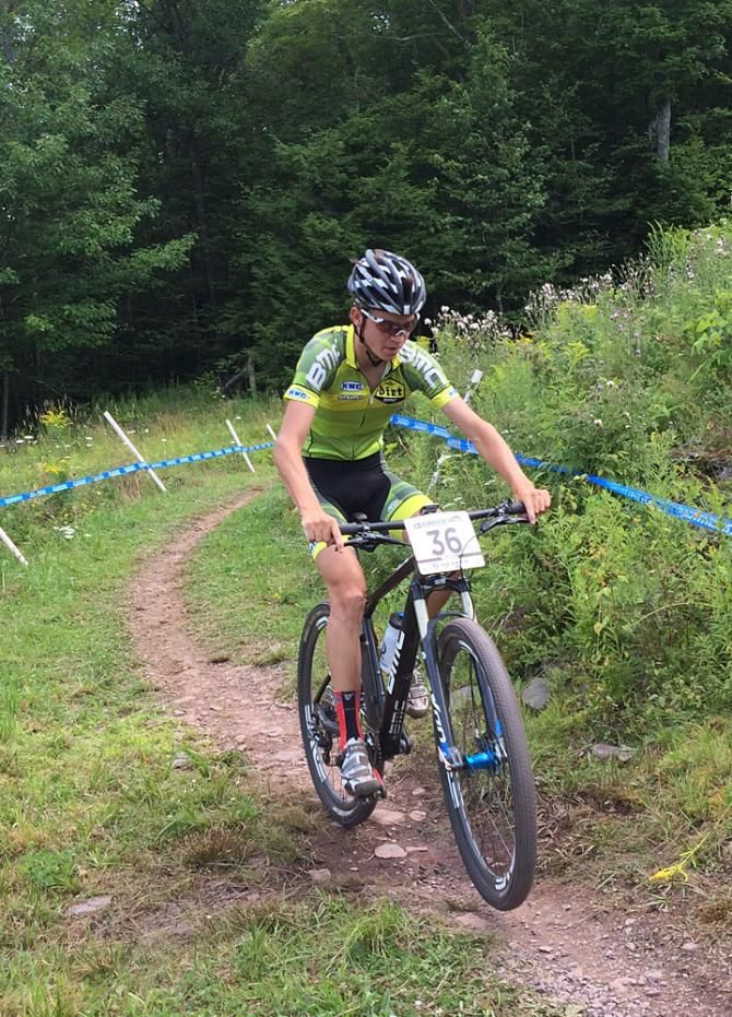 A BMC / Project Dirt rider out on course