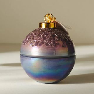 Christmas bauble-shaped candle