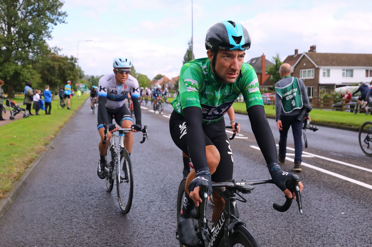 Elia Viviani not looking too happy after the wet stage