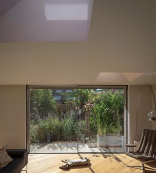 The diagonal floorboards add another layer of intrigue to the space