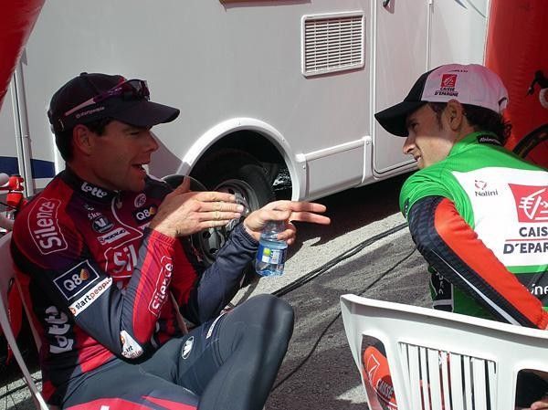 'Next month, you climb here and I'll sit in behind, okay?' Cadel Evans (Silence-Lotto) chats with Alejandro Valverde (Caisse d'Epargne).