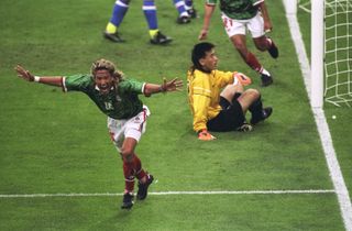 Luis Hernandez celebrates after scoring for Mexico against South Korea at the 1998 World Cup.