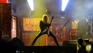 Richie Faulkner performs onstage with Judas Priest at Foro Pegaso in Toluca, Mexico on December 3, 2022