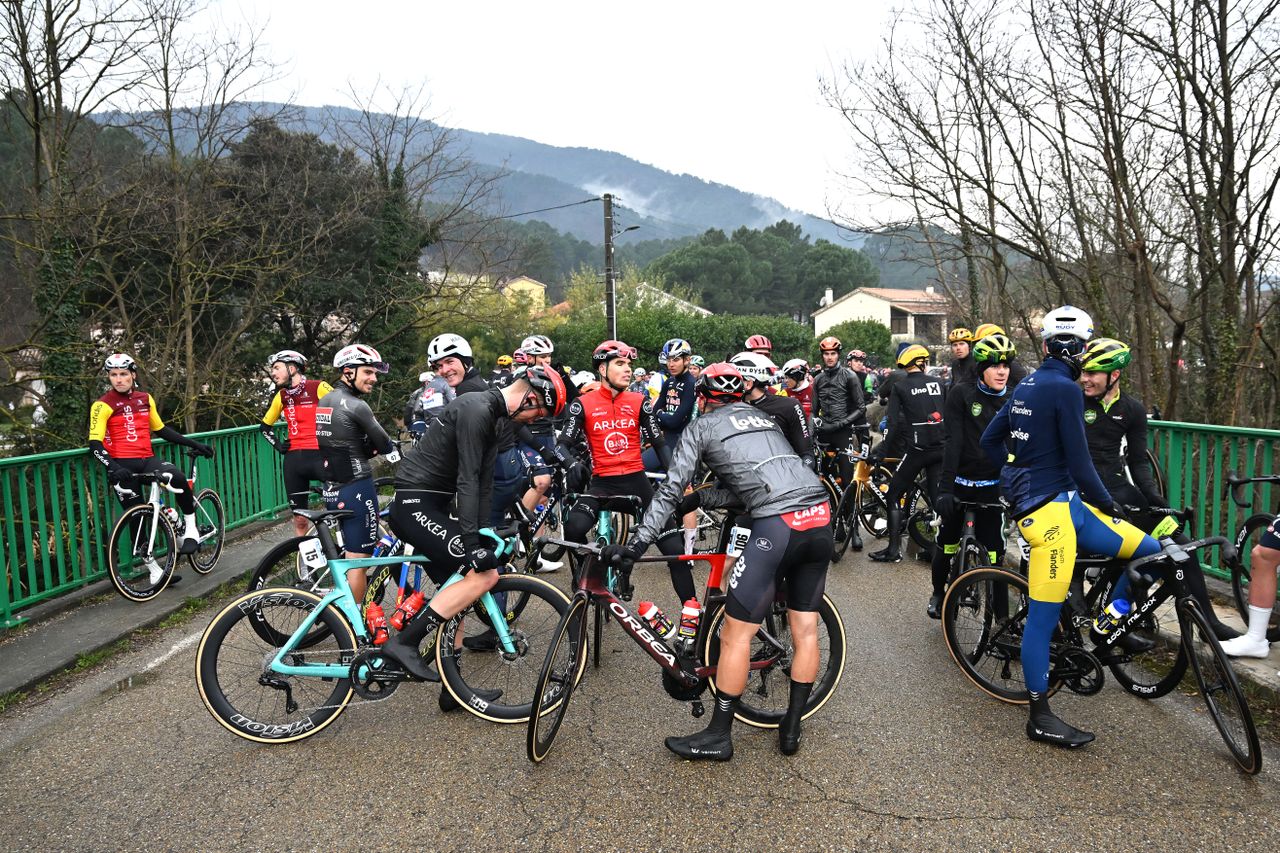 The peloton stops in protest during the 55th Etoile de Besseges 