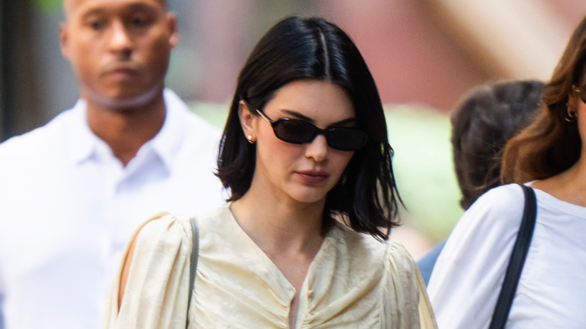 Kendall Jenner wears a butter yellow dress with sunglasses in New York City
