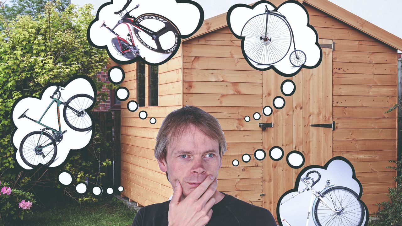 Dr Hutch at his shed considering bikes