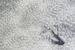 Swirling clouds near Saint Helena, an island in the South Atlantic Ocean, as photographed by NASA's Terra satellite on Nov. 15, 2012.